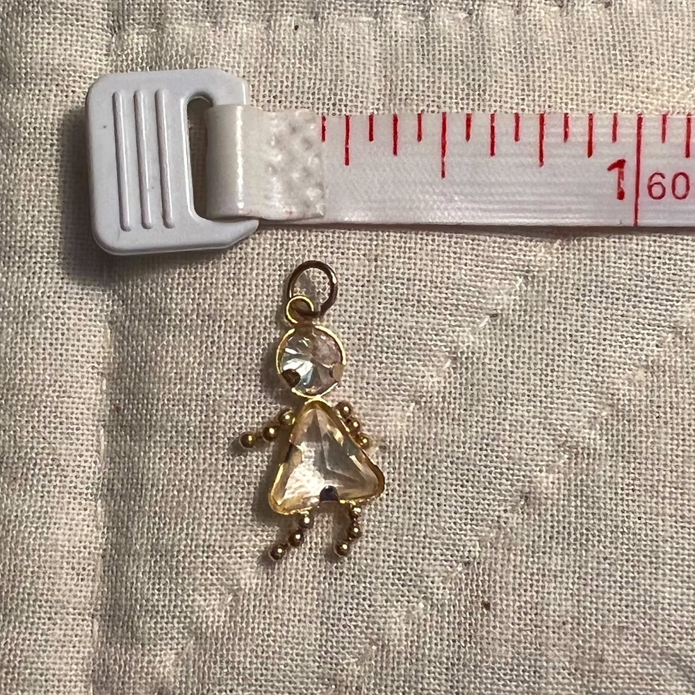 Dante and adorable little girl charm in gold.